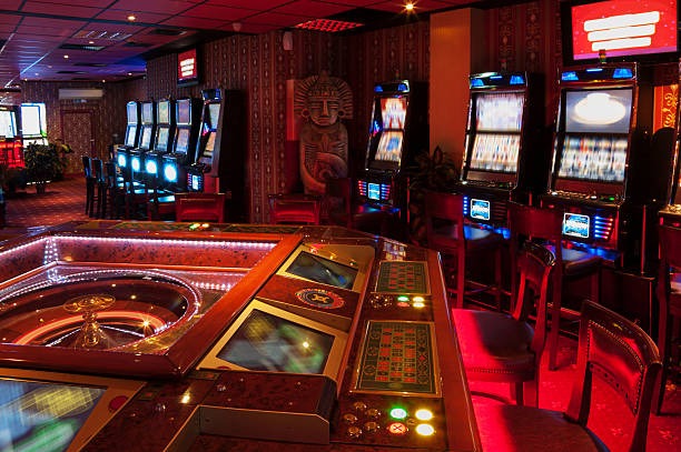 Free Play slot interface showing game library and virtual credit balance